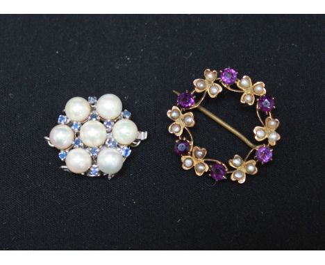 A 9ct gold, seed pearl and amethyst wreath brooch; and a 14ct white gold and pearl necklace clasp (2).