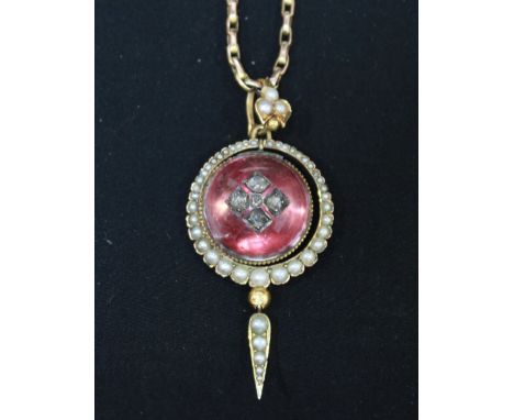 A 9ct gold and seed pearl necklace, with large circular cabochon surrounded by split seed pearls. Approx weight 12 grams.