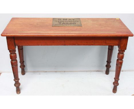 A Late 19th/ early 20th century mahogany tailor's table, of rectangular form, with inset imperial scale brass measuring ruler