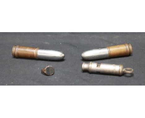 Two WWII bullet case novelty lighters, a Metropolitan Police whistle and a 9ct gold seal ring (4).