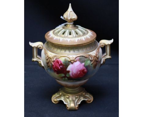 A Royal Worcester blush ivory pot pourri vase and cover, painted with roses. Green mark to base, circa 1912. 18 cm high.