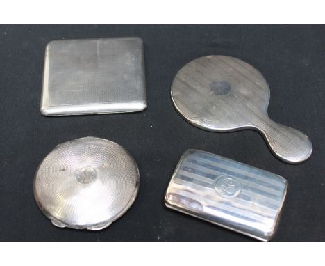 Two silver cigarette cases; a silver compact; and a miniature silver hand mirror. Weighable silver approx. 5.4 oz.