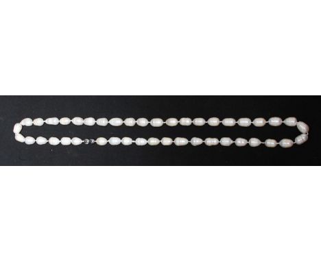 A cultured "baroque" pearl necklace, recently re-strung with 43-pearls, in original box with spare threading string.  