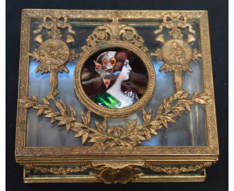 A 19th century French ormolu and glass box and cover, the hinged lid with central inset painted enamel portrait of a young wo