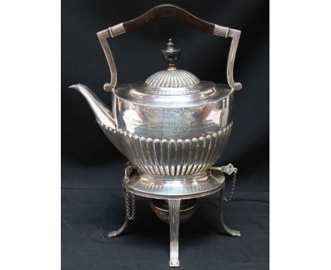 An Edwardian silver kettle on stand with spirit burner, half-reeded body and domed cover, ebonised handle, engraved "Presente