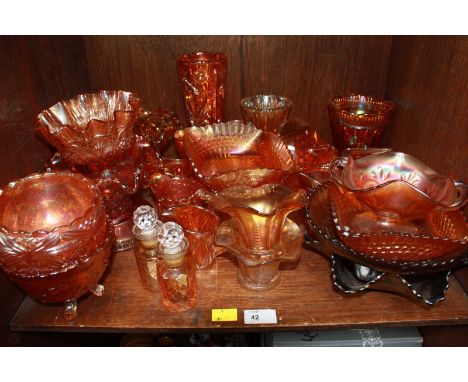 SECTION 42. A shelf lot of assorted Carnival glass.