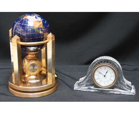 A Waterford Crystal small domed mantel clock, 10cm high, together with a modern globe mantel clock with quartz movement, hygr