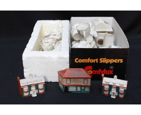 A collection of assorted crested china, including Goss, Arcadian and others, including two Goss Charles Dickens cottages and 