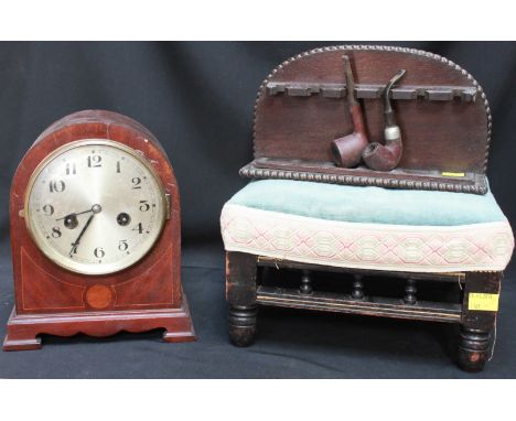 A Victorian ebonised footstool, a 1930s mantle clock and an oak pipe rack.