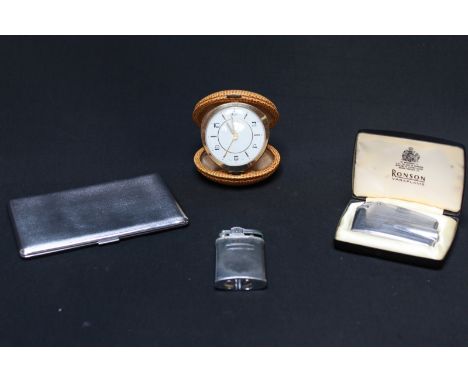 Two Ronson chrome plated cigarette lighters, together with a chrome plated cigarette case and an Oris travelling alarm clock 