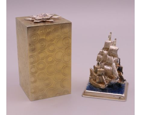 A Stuart Devlin parcel-gilt silver 'Surprise' Christmas box and cover - 'I Saw Three Ships' (the interior modelled with three