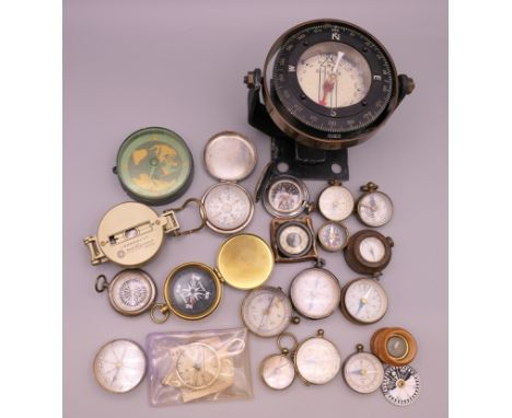 A Silva marine compass with bracket mount, together with a quantity of various compasses.  Silva compass 8.5 cm diameter.  