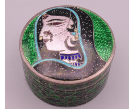 An Indian silver enamel box.  4.25 cm diameter.