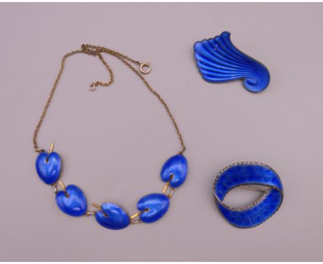 Two Scandinavian enamel and silver brooches and a necklace.  Necklace 42 cm long.