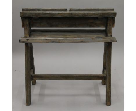 An artist's easel. 71 cm wide.