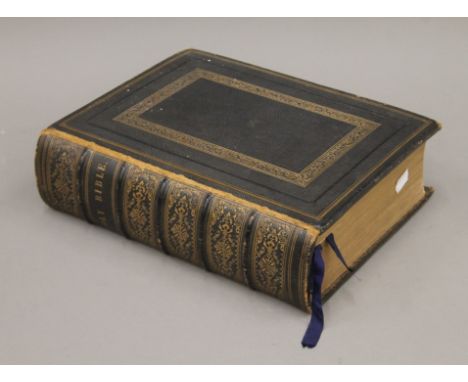 A finely bound Family Bible with gilt edge pages, approximately 900 engravings, 1875, first edition.