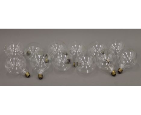 A quantity of large retro style light bulbs. Approximately 16 cm high.