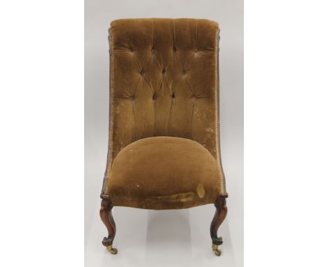 A Victorian rosewood framed button back nursing chair. 