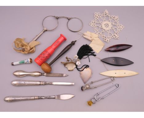 A quantity of miscellaneous items, including lorgnettes, an enamel cigarette holder, etc.