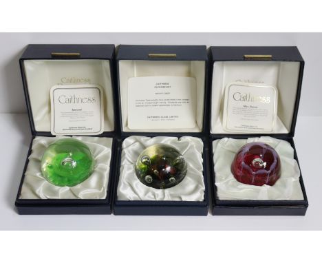 Four Caithness glass paperweights; together with four other glass paperweights, boxed &amp; unboxed.