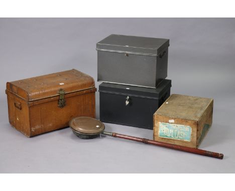 A grained-tin domed-top travelling trunk, 59.25cm wide; together with two other trunks; a vintage wooden box; &amp; a copper 