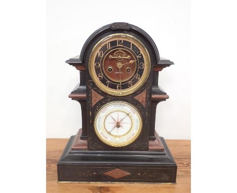 A black marble Mantel Clock/Barometer, the circular clock dial with exposed movement, above a circular barometer dial and hav