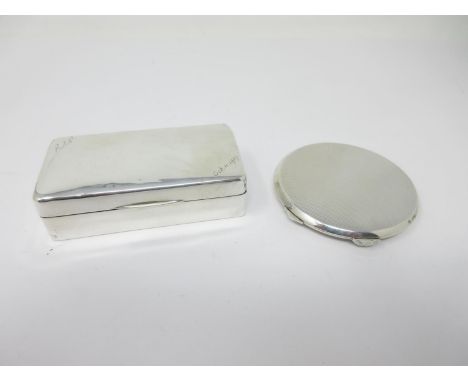 A George V silver small Jewel Box engraved initials, Birmingham 1924 and a silver circular Compact, Birmingham 1942. 