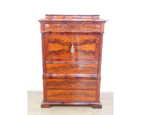 A 19th Century mahogany Secretaire A Abbatant with caddy top above fall front enclosing six small drawers and door with satin