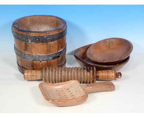A 19th Century elm Cheese Mould, a dairy straining spoon, two small sycamore Dairy Bowls and a sycamore oat Roller 