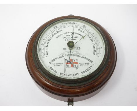An oak cased circular Marine Aneroid Barometer by Dollond, London, No 733, 'The Shipwrecked Fishermen &amp; Mariners' Royal B