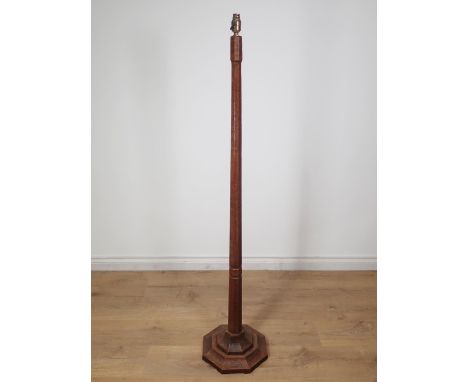 An oak Albert "Eagleman" Jeffray Standard Lamp with octagonal adzed tapering column on stepped octagonal base, 4ft 10in H 