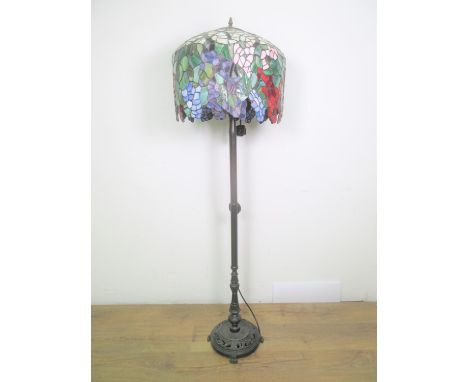 A Standard Lamp with Tiffany style shade 