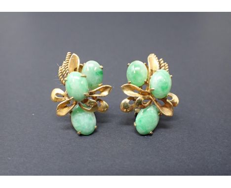 A pair of Jade Flower Spray Ear Clips each claw-set three oval cabochons, stamped 14K, approx 10gms 