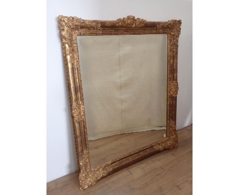 A large gilt-framed Wall Mirror, 4ft 10in x 4ft 2in 