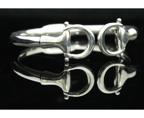 A sterling silver Gucci style snaffle expandable bangle, stamped "925"