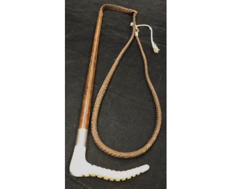 A child's / lady's riding crop with antler handle and silver ferrule inscribed "N.J 1933" with leather shaft and plaited leat