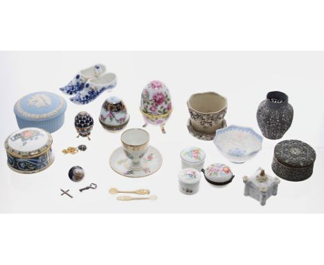 Collection of assorted porcelain and pottery trinket boxes, egg form boxes etc. including a Dresden egg cup, Wedgwood Blue El