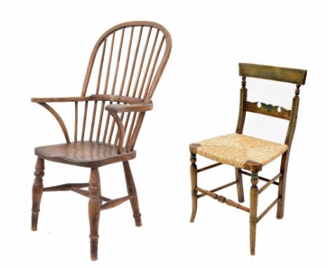 19th century elm seat comb back Windsor armchair, 41" high; together with a 19th century painted rush seat single chair (2)