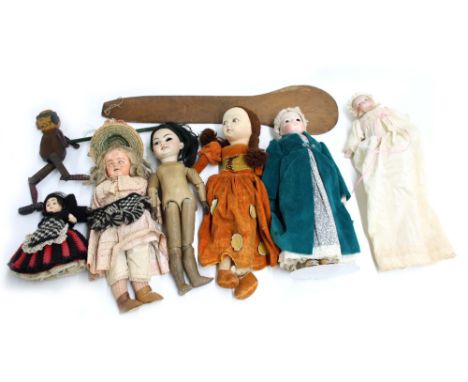 Assorted vintage dolls including bisque and felted examples, some articulated, mostly clothed, one mounted on stand; also a v