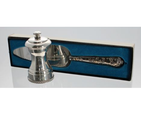Silver pepper mill, maker Francis Howard Ltd. Birmingham 1975, 4" high. Also a silver handled pie server by Harrison Brothers