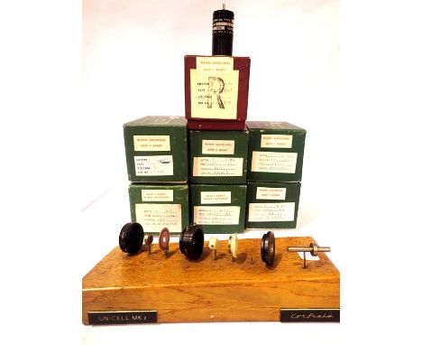 Seven rank motors for radio controlled vehicles together with a mounted exploded example. P&amp;P Group 2 (£18+VAT for the fi