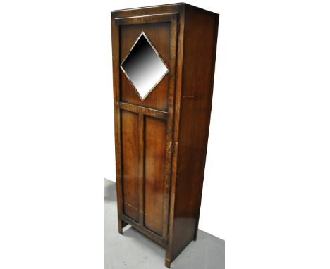 A c.1940s oak hall robe with diamond shaped mirror, 180 x 59 cm.