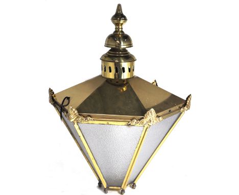 A large reproduction brass wall lantern with mounting bracket, height approx 90cm.