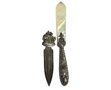 A silver bookmark with a sailing ship finial, continental silver marks and a silver and mother of pearl page turner, marks ru