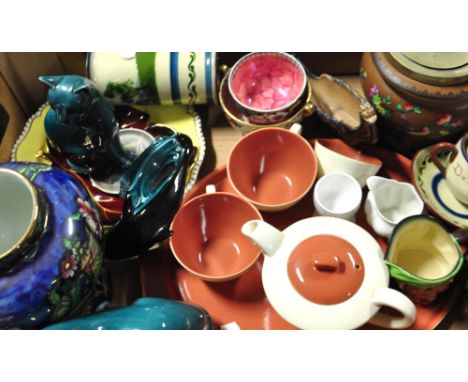 A collectors lot to include a Poole cabaret set, a pair of Poole cats, Poole dolphin, Maling and Carltonware etc. CONDITION R