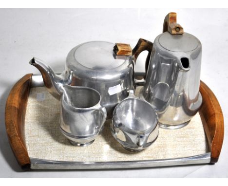 A Piquot Ware tea set to include teapot, sugar bowl, milk jug, coffee pot and tray.