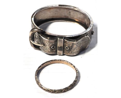 A hallmarked silver buckle bracelet and a baby's white metal bangle, approx weight 1.30zt (2).