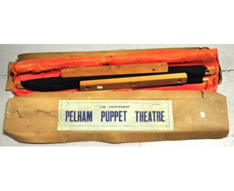 A boxed "The Lightweight Pelham Puppet Theatre" (box af).