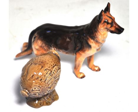 A Royal Doulton Alsatian figure and a Beswick Beneagles Scotch Whiskey model by A.Hallam 1972 (2).