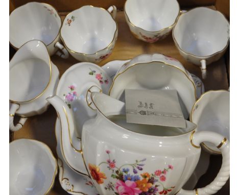 A boxed set of Royal Crown Derby, "Derby Posies" six piece tea service to include a teapot and stand.